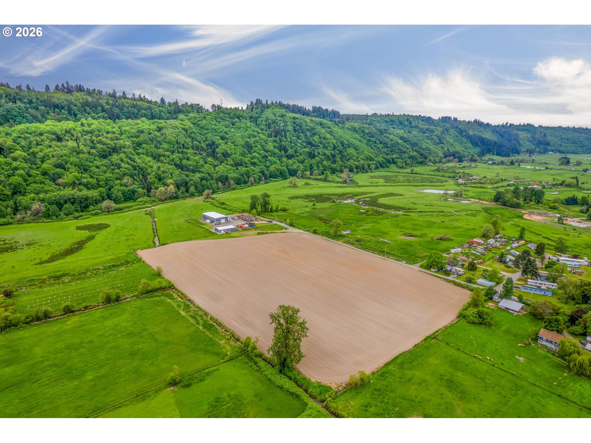 0 Barton Road Rainier, OR 97048 - Photo 2 of 10 a view of a golf course with a garden