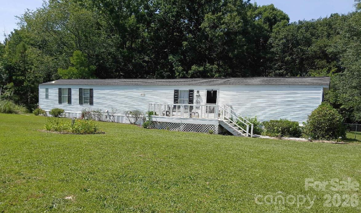 2157 Ross Cauthen Road Lancaster, SC 29720 - Photo 2 of 22 a view of a house with a yard and sitting area