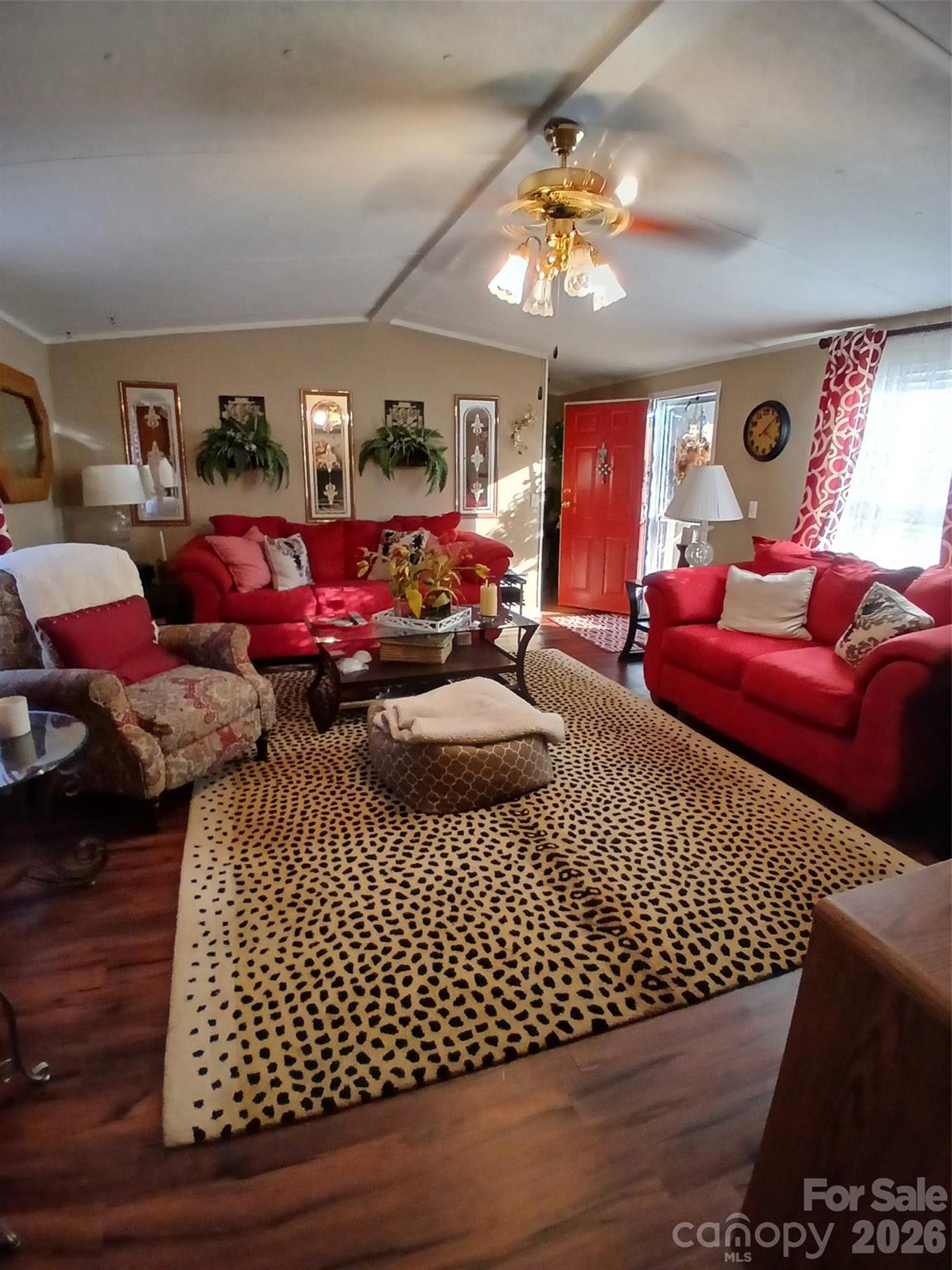 2157 Ross Cauthen Road Lancaster, SC 29720 - Photo 4 of 22 a bedroom with furniture and a chandelier