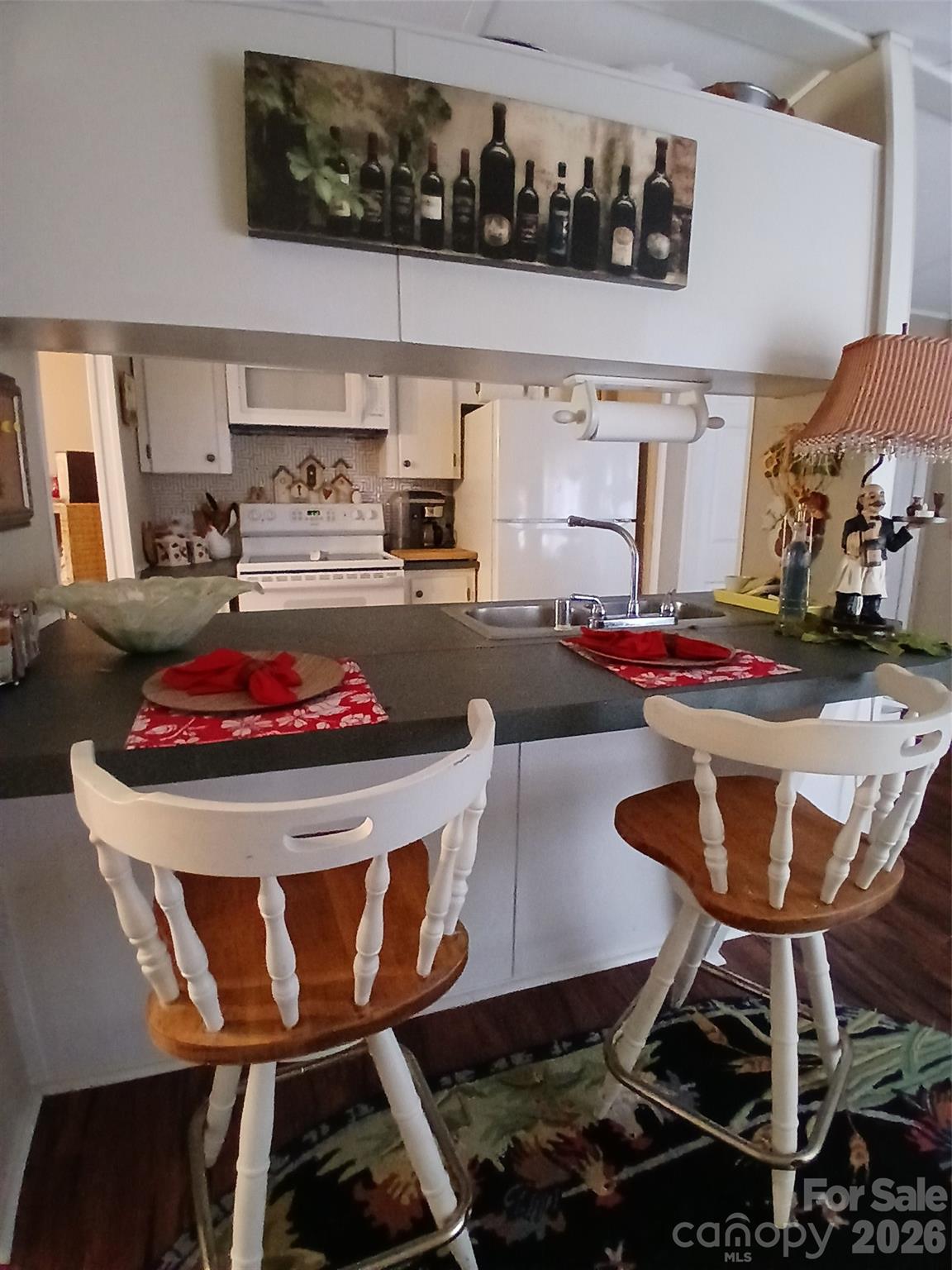 2157 Ross Cauthen Road Lancaster, SC 29720 - Photo 7 of 22 a kitchen with a dining table and chairs