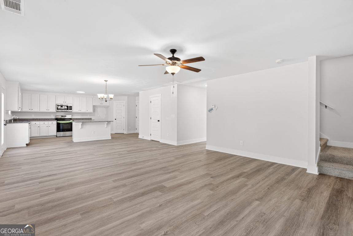 538 Oil Mill Road, Unit 8 Martin, GA 30557 - Photo 13 of 50 a view of an empty room with a kitchen