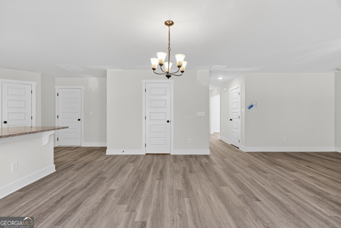 538 Oil Mill Road, Unit 8 Martin, GA 30557 - Photo 16 of 50 wooden floor in an empty room with a window