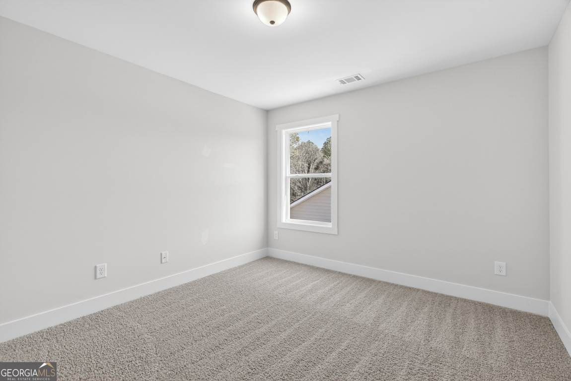 538 Oil Mill Road, Unit 8 Martin, GA 30557 - Photo 26 of 50 an empty room with windows