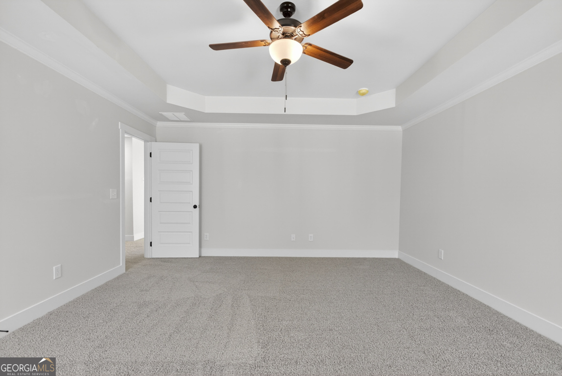 538 Oil Mill Road, Unit 8 Martin, GA 30557 - Photo 39 of 50 an empty room with chandelier fan