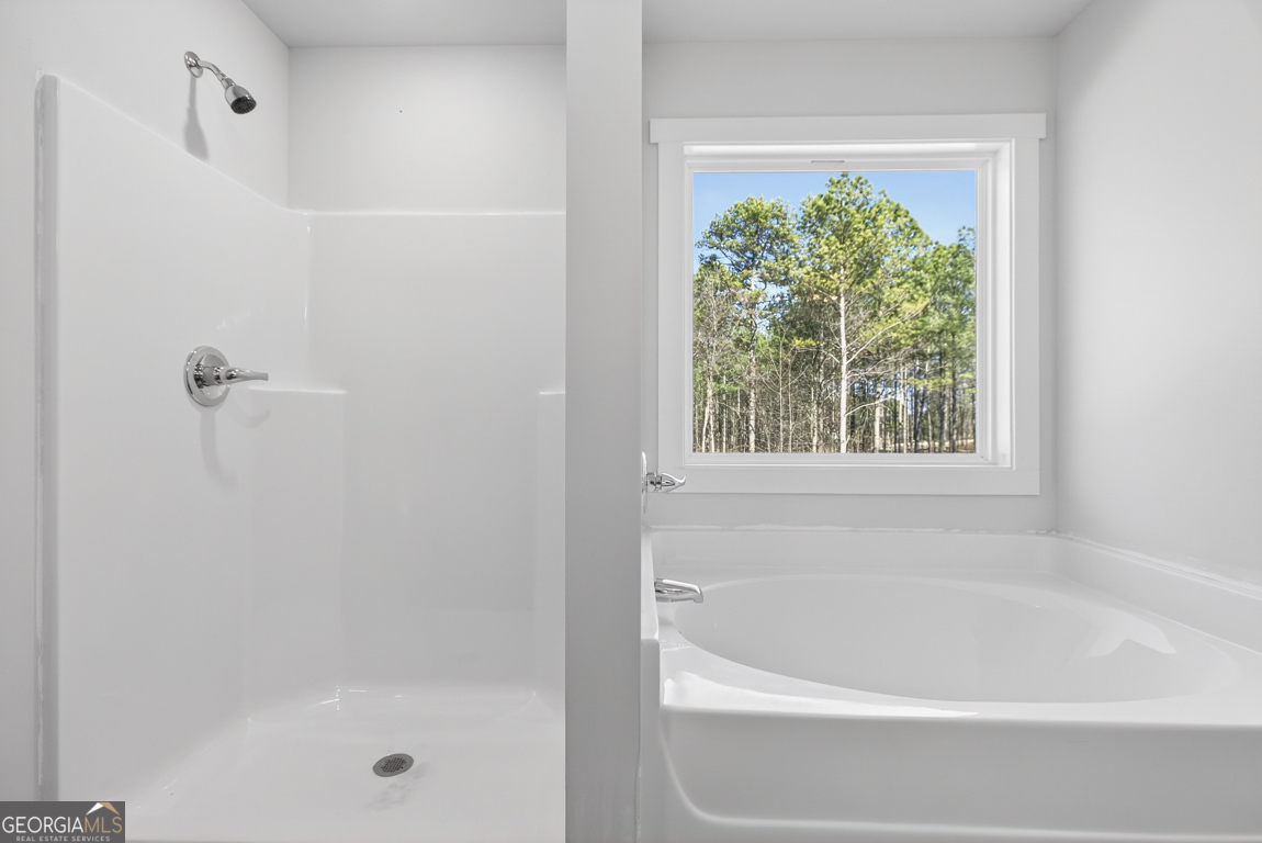 538 Oil Mill Road, Unit 8 Martin, GA 30557 - Photo 43 of 50 a white bath tub sitting next to a window
