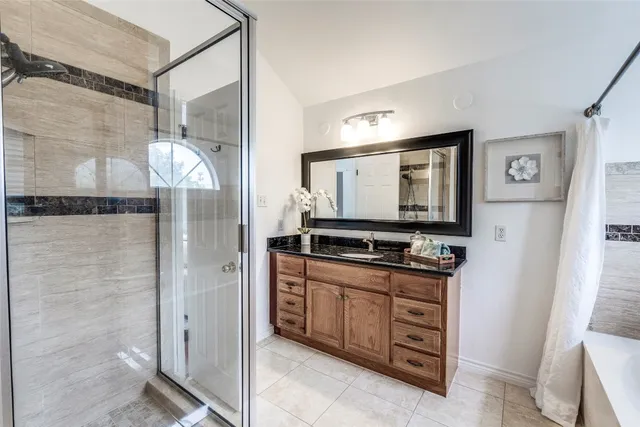 a kitchen with stainless steel appliances a stove and a refrigerator