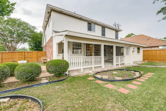 an aerial view of a house with garden