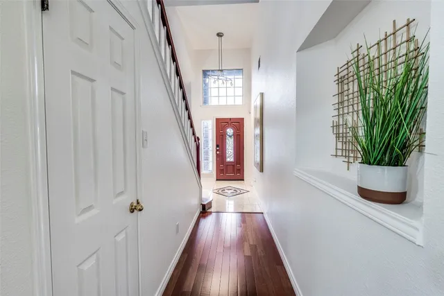 a view of entryway with wooden floor