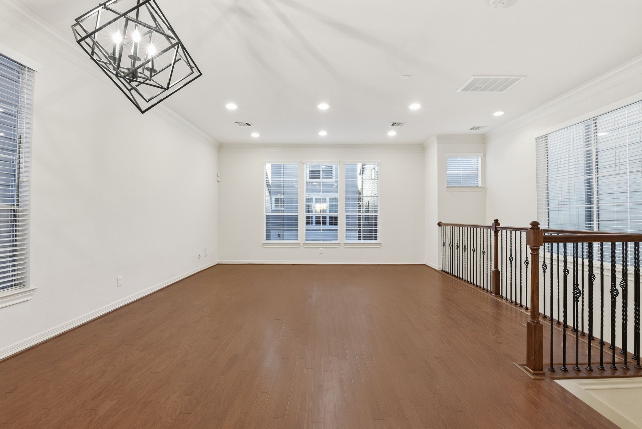 3209 Clearview Circle Houston, TX 77025 - Photo 16 of 40 a view of an empty room with wooden floor and a window