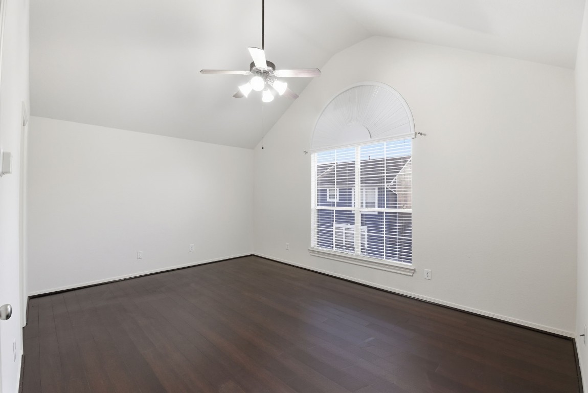 3209 Clearview Circle Houston, TX 77025 - Photo 28 of 40 an empty room with wooden floor and window