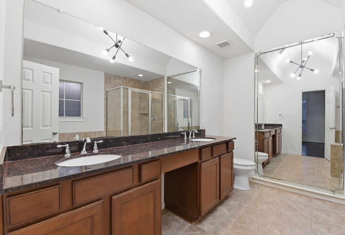 3209 Clearview Circle Houston, TX 77025 - Photo 31 of 40 a spacious bathroom with a granite countertop sink mirror and double