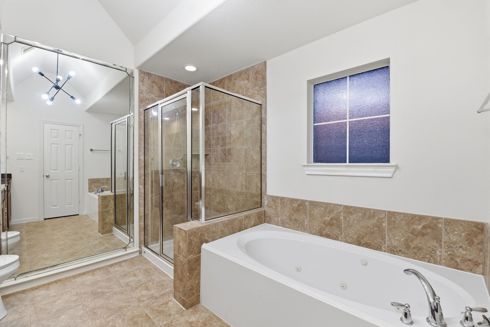 3209 Clearview Circle Houston, TX 77025 - Photo 32 of 40 a bathroom with a bathtub and a shower