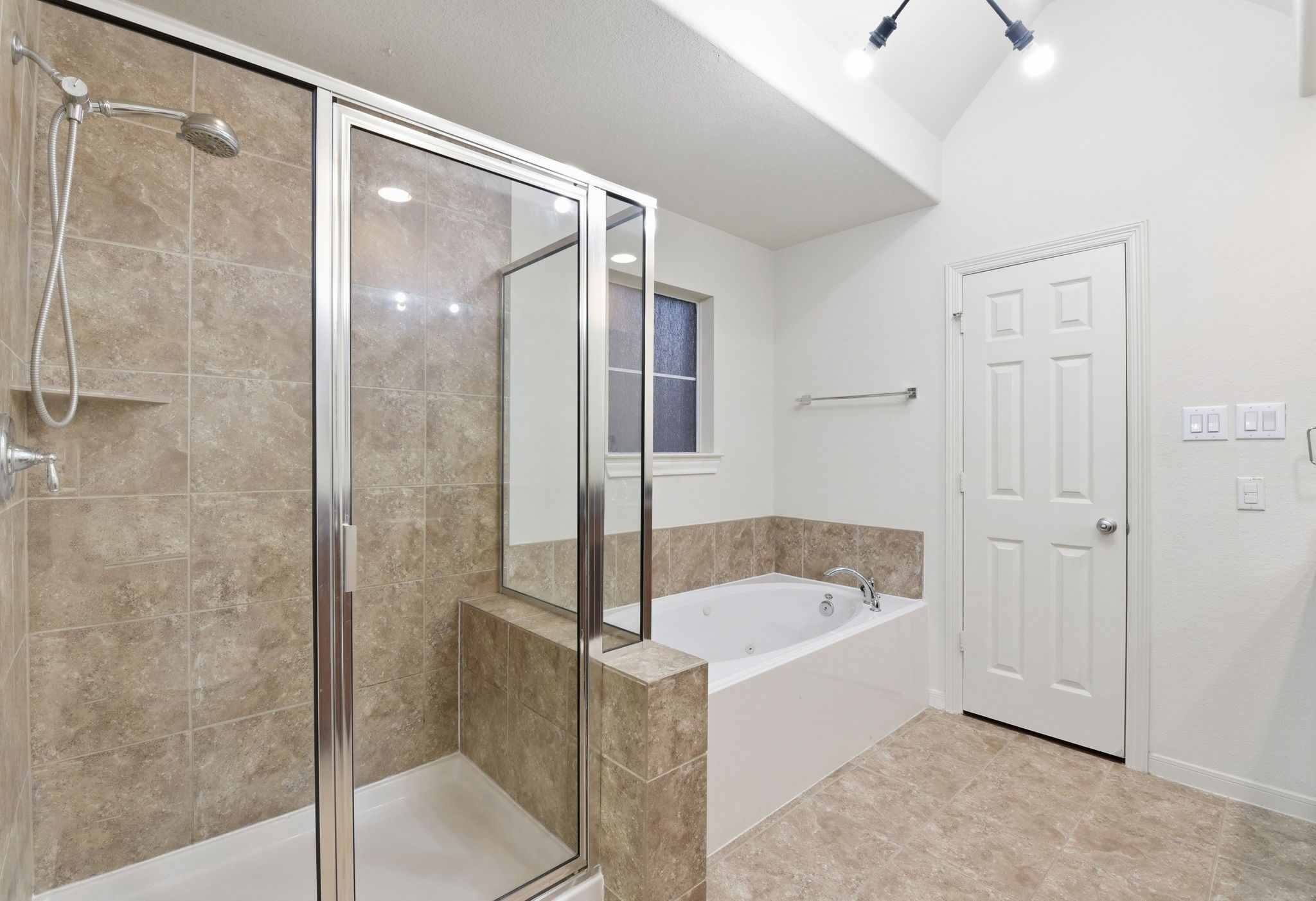 3209 Clearview Circle Houston, TX 77025 - Photo 33 of 40 a bathroom with a bathtub and a shower