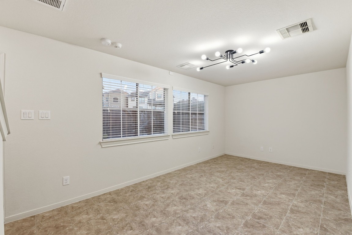 3209 Clearview Circle Houston, TX 77025 - Photo 8 of 40 a view of an empty room with a window