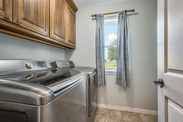 a kitchen with a stove and a refrigerator