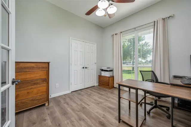 a workspace with furniture and a window