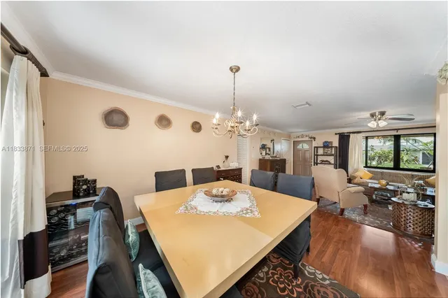 a bed room with a bed and a television