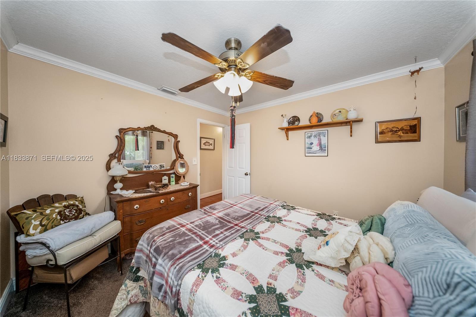 11193 Southwest 113th Terrace Miami, FL 33176 - Photo 26 of 43 a bedroom with a bed and window