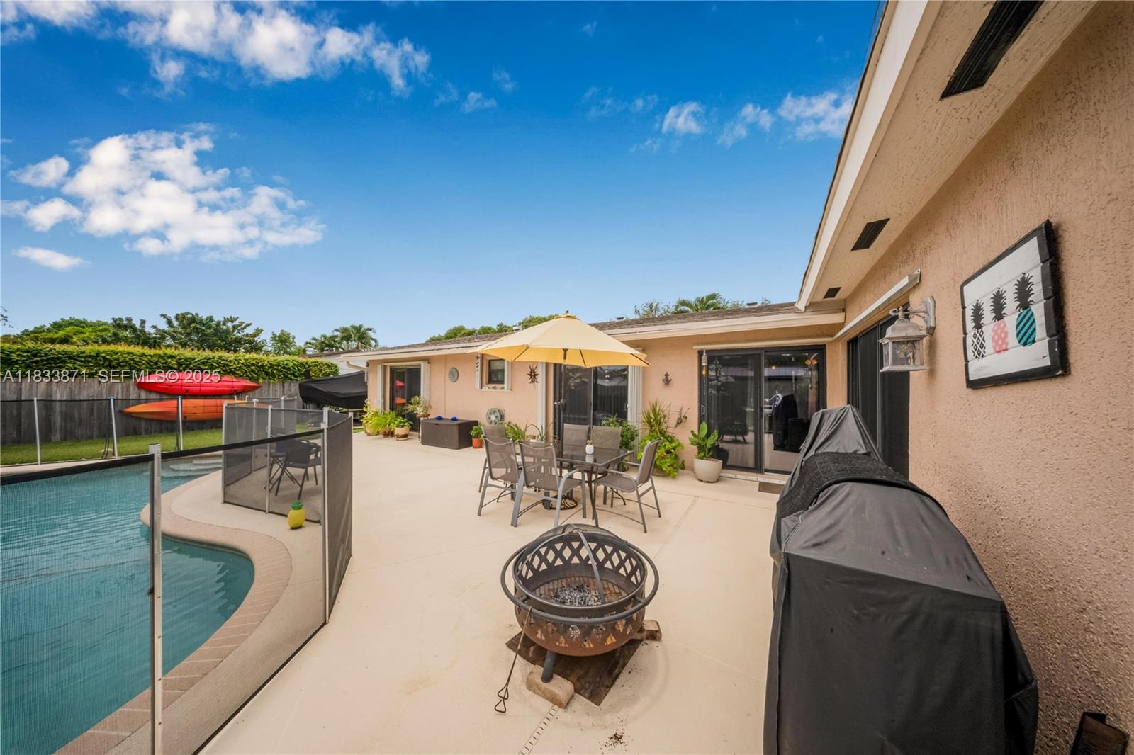 11193 Southwest 113th Terrace Miami, FL 33176 - Photo 36 of 43 a view of a terrace with furniture