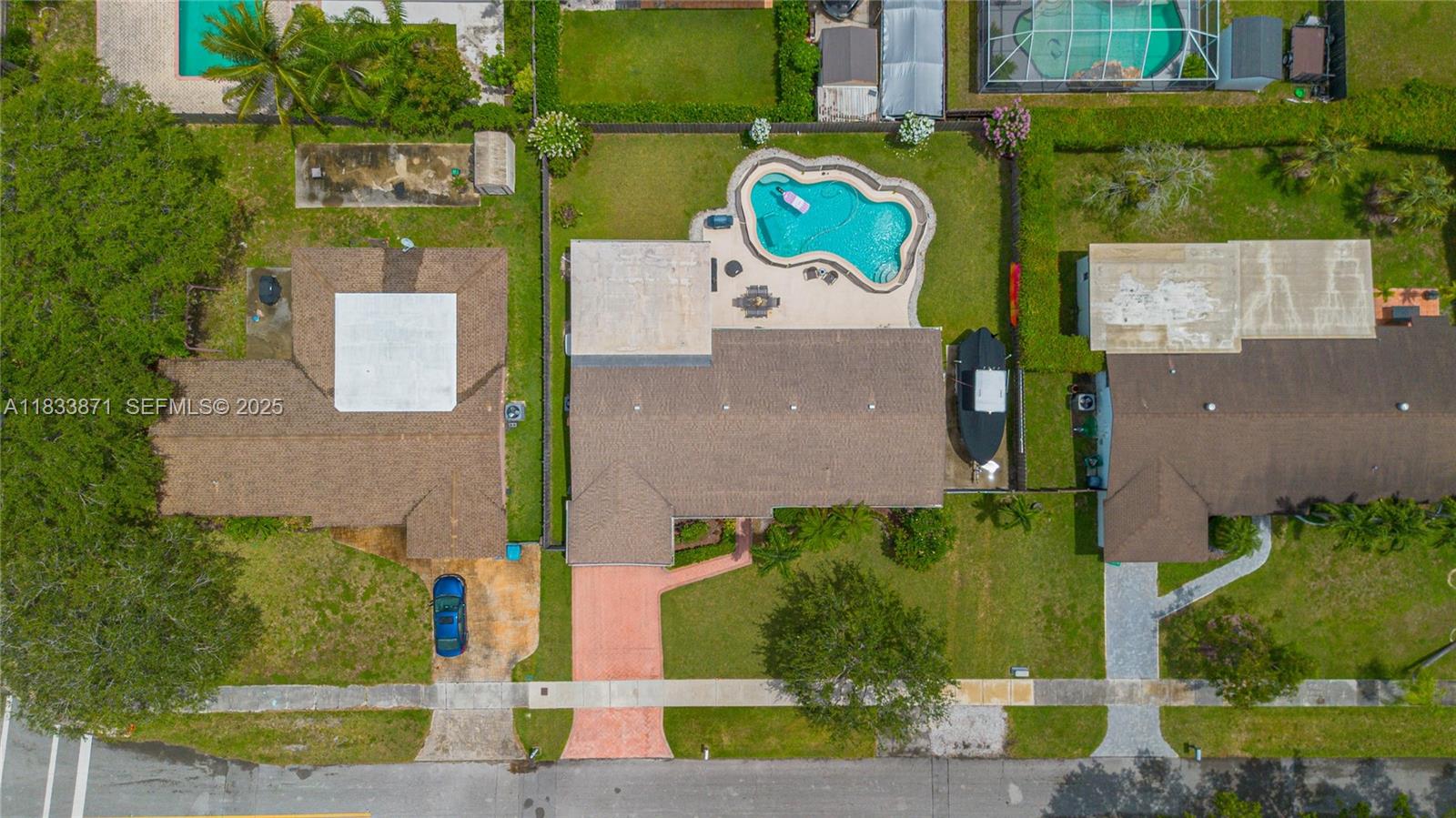 11193 Southwest 113th Terrace Miami, FL 33176 - Photo 43 of 43 an aerial view of a house with a swimming pool