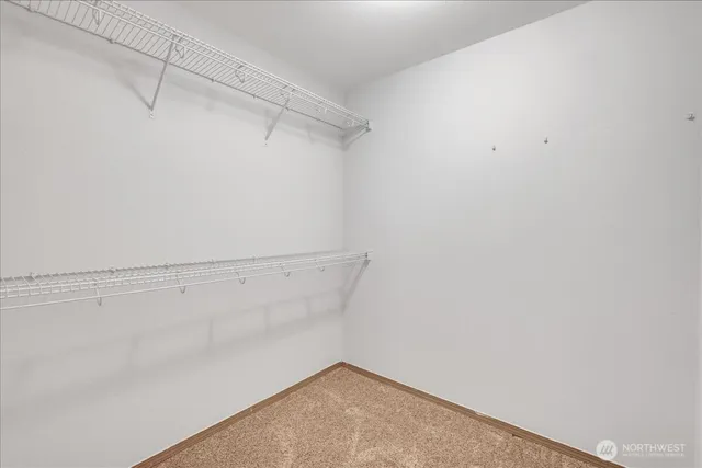 a view of a room with racks on the wall