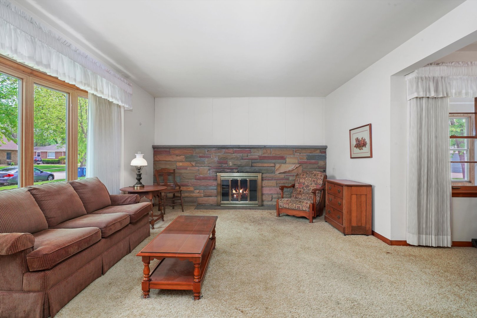 1350 Perry Street Crete, IL 60417 - Photo 3 of 17 a living room with furniture and a fireplace