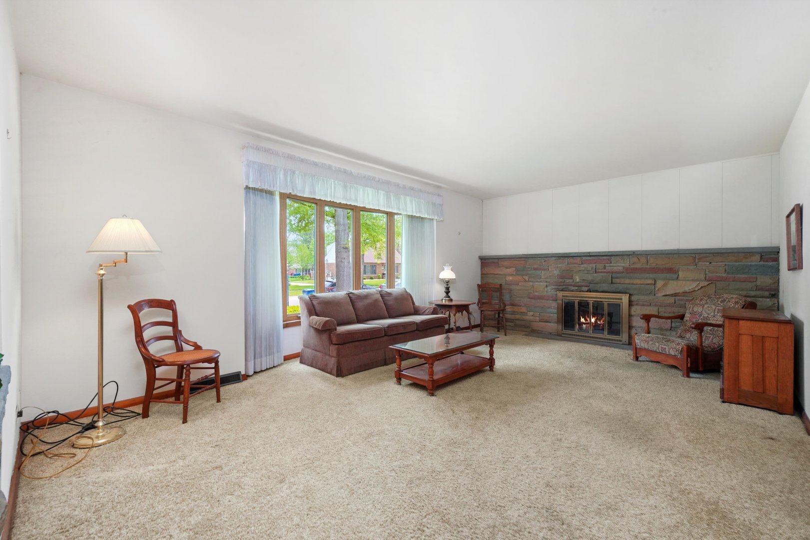1350 Perry Street Crete, IL 60417 - Photo 4 of 17 a living room with furniture and a fireplace