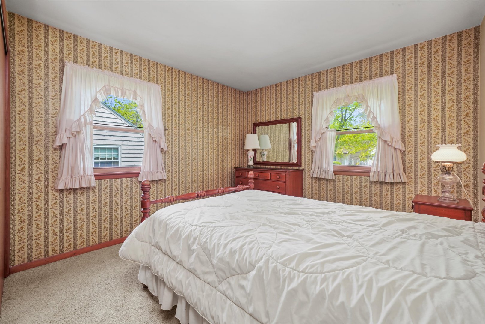 1350 Perry Street Crete, IL 60417 - Photo 9 of 17 a bedroom with a bed and a large window
