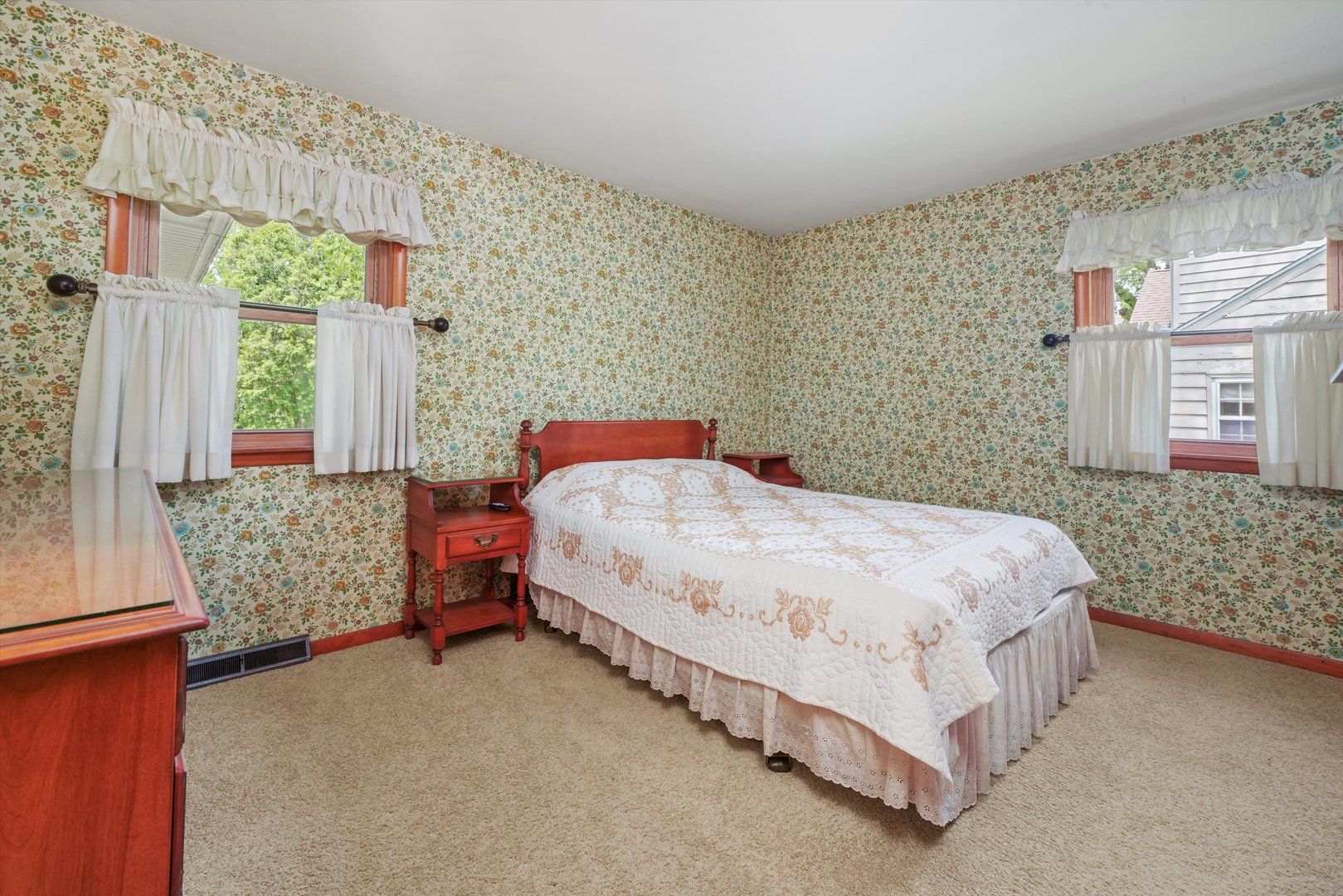 1350 Perry Street Crete, IL 60417 - Photo 10 of 17 a bedroom with a bed lamp and window
