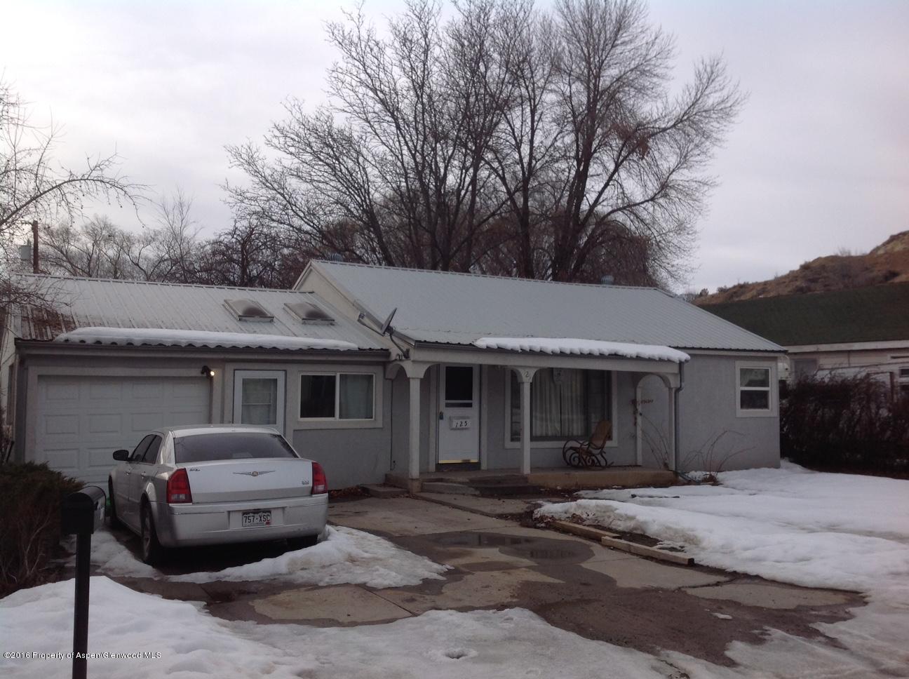 125 Daniel Avenue Rifle, CO 81650 - Photo 2 of 12 a car parked in front of house