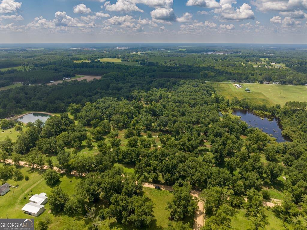 229 Hudson Road Fitzgerald, GA 31750 - Photo 2 of 16 a view of a city with lots of trees