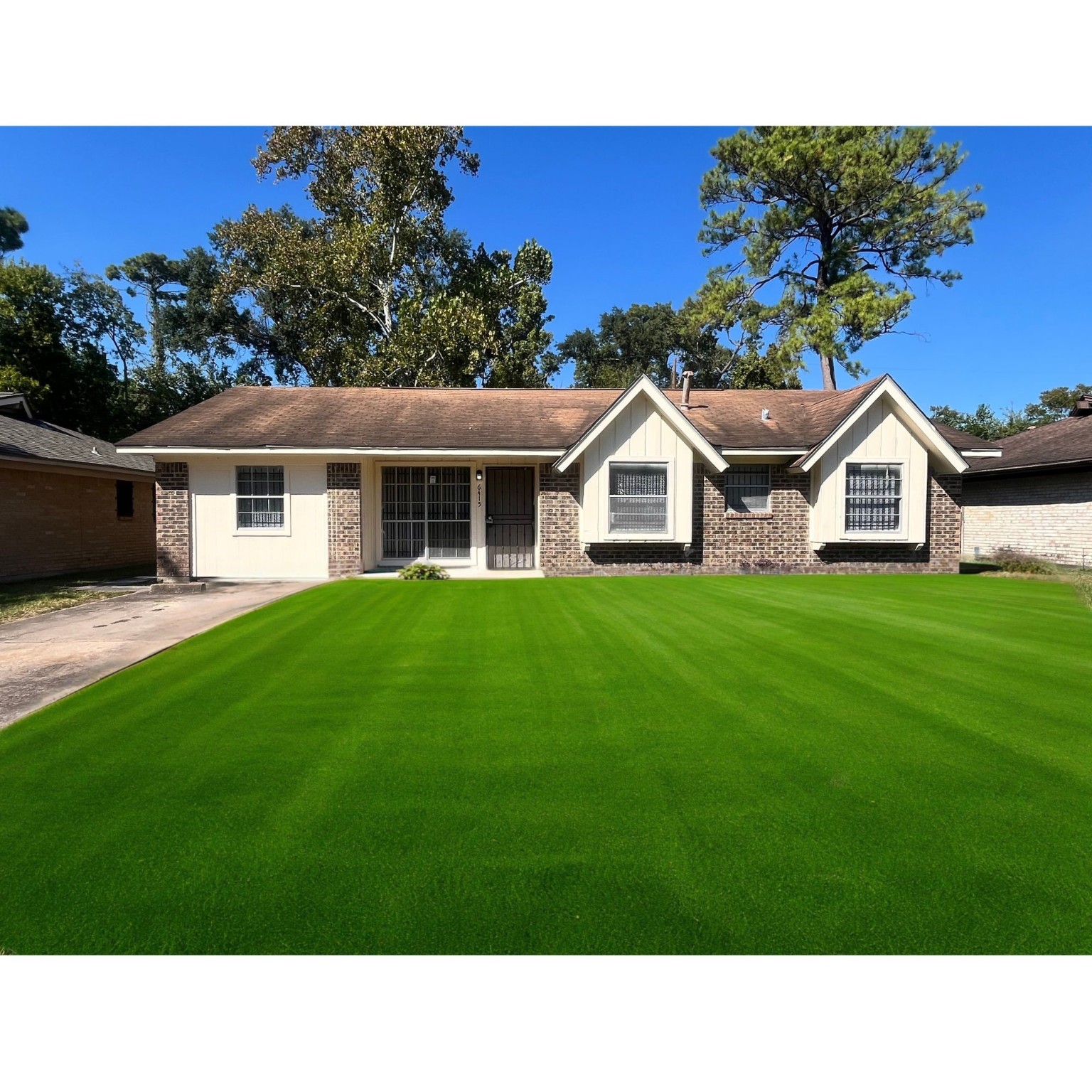 a house view with a garden space