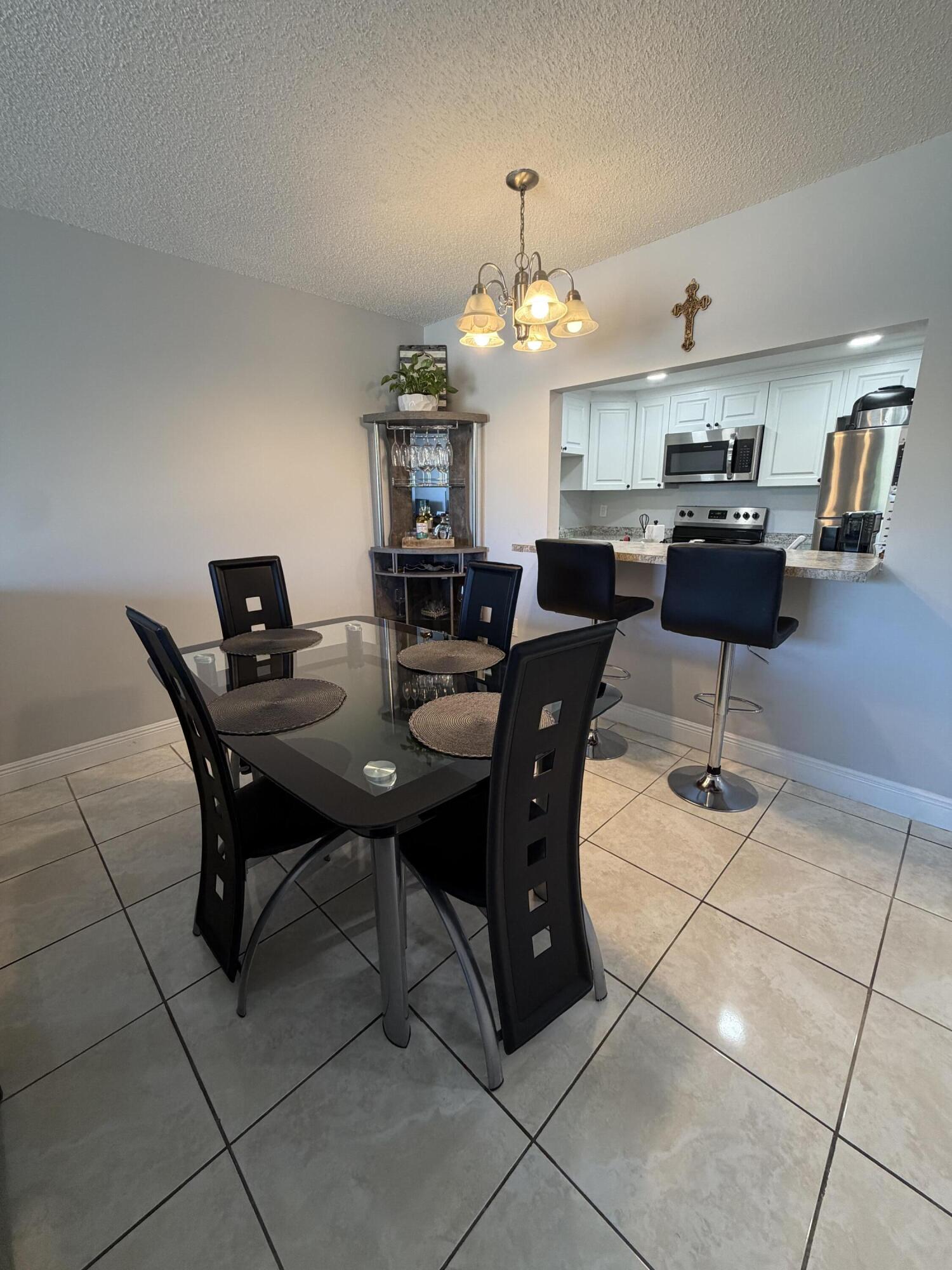4174 Inverrary Drive, Unit 309 Lauderhill, FL 33319 - Photo 11 of 24 Dining Room