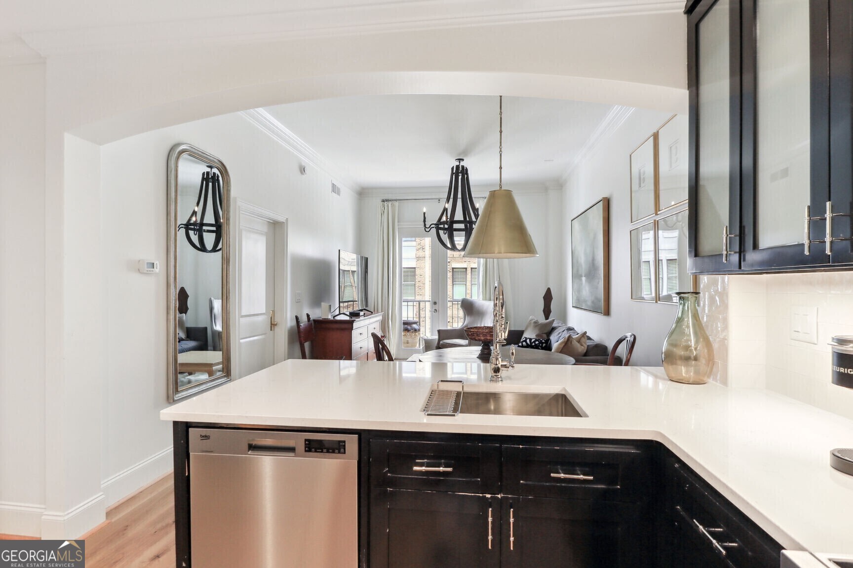 2255 Peachtree Road Northeast, Unit 825 Atlanta, GA 30305 - Photo 6 of 15 a kitchen with a sink and a refrigerator
