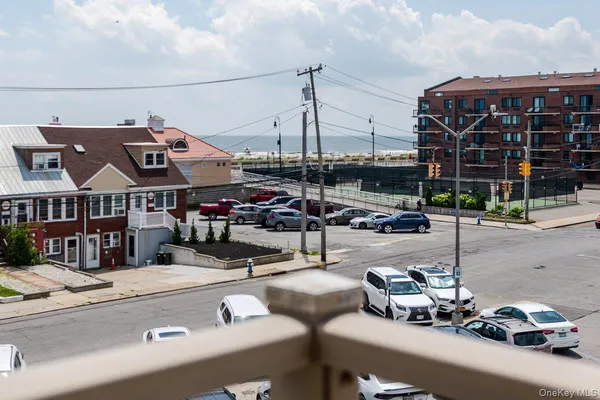 a view of a street with cars