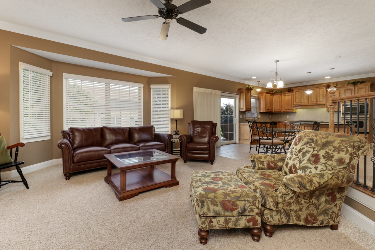 4012 Rockledge Road Bloomington, IL 61705 - Photo 11 of 63 a living room with furniture and a large window