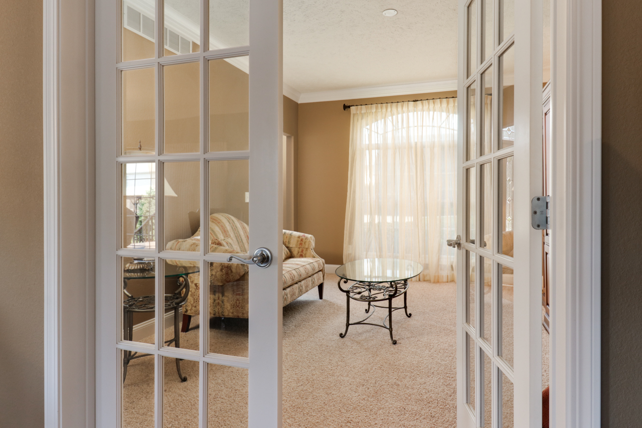 4012 Rockledge Road Bloomington, IL 61705 - Photo 13 of 63 a living room with furniture and a large window