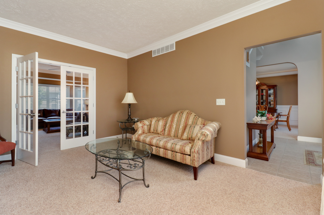 4012 Rockledge Road Bloomington, IL 61705 - Photo 14 of 63 a living room with furniture and a window