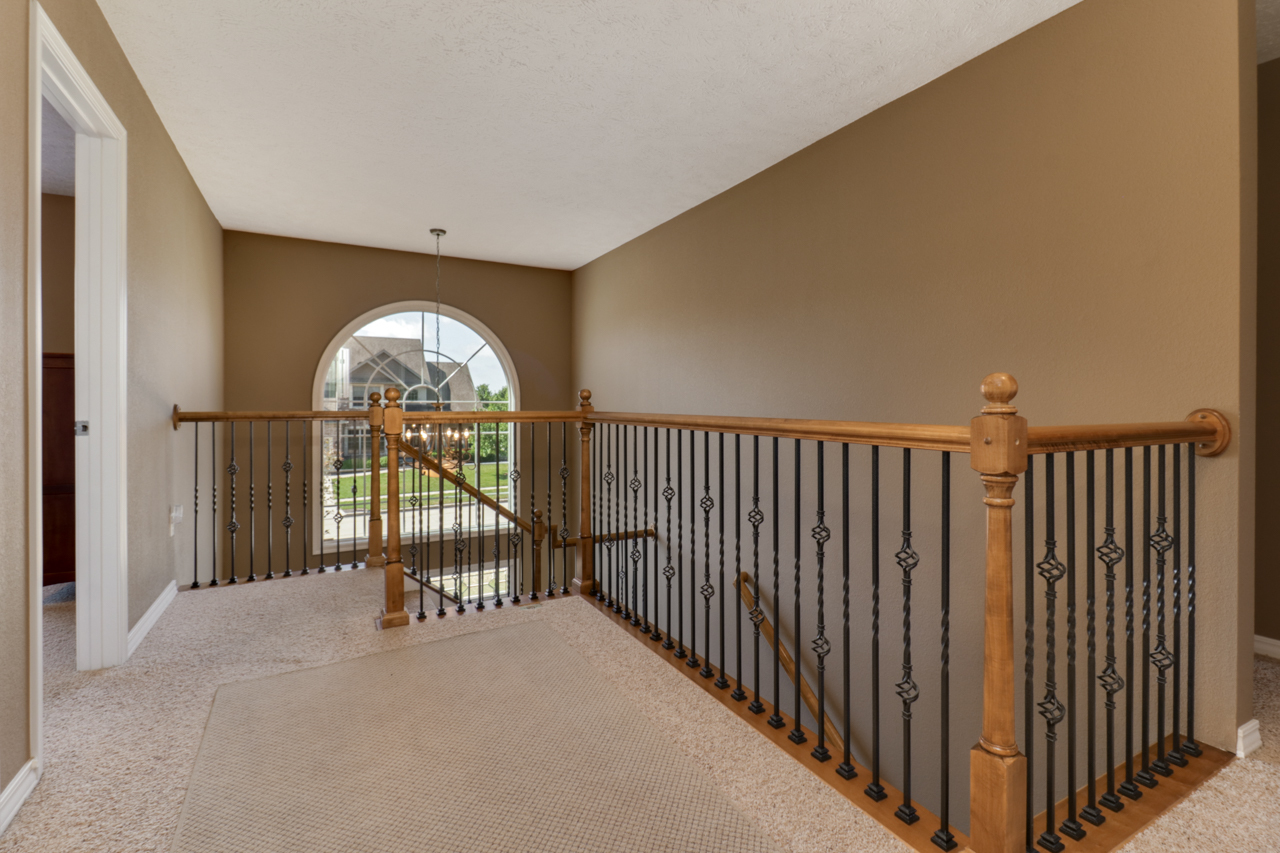 4012 Rockledge Road Bloomington, IL 61705 - Photo 29 of 63 a view of a hallway with a large window