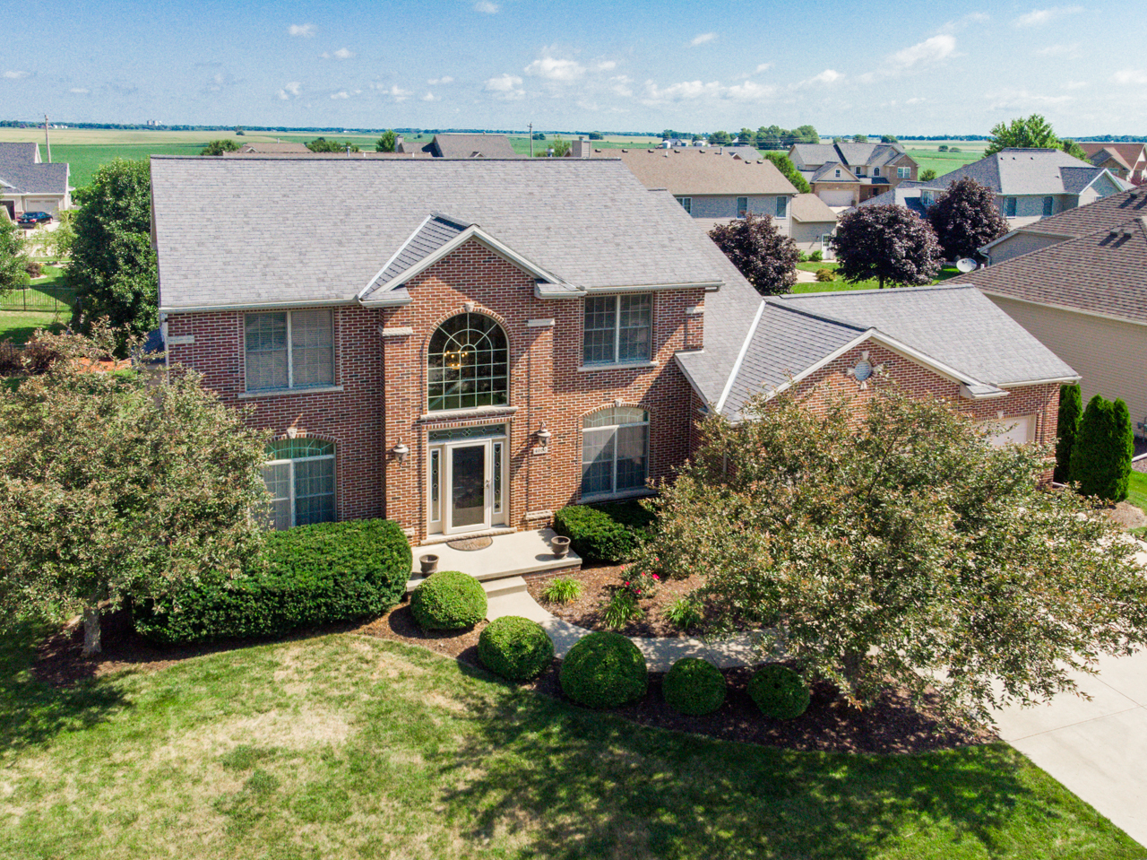4012 Rockledge Road Bloomington, IL 61705 - Photo 61 of 63 an aerial view of house with yard and outdoor seating