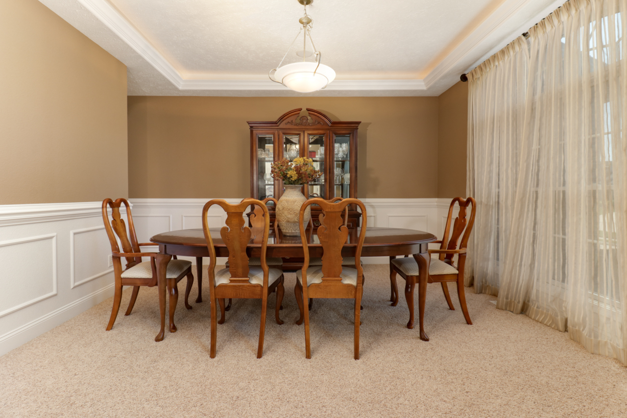 4012 Rockledge Road Bloomington, IL 61705 - Photo 7 of 63 a view of a dining room with furniture and chandelier