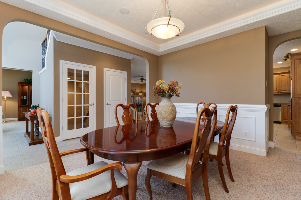 4012 Rockledge Road Bloomington, IL 61705 - Photo 8 of 63 a view of a dining room with furniture and wooden floor