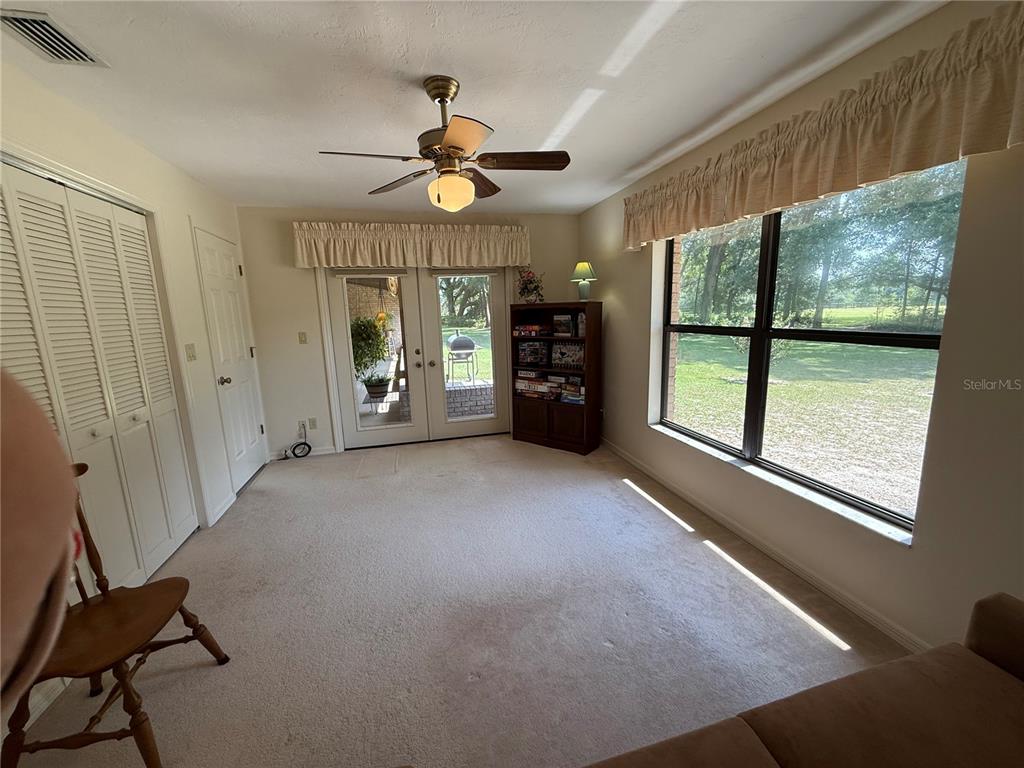 9901 Southwest 67th Terrace Ocala, FL 34476 - Photo 29 of 71 a view of an empty room with a window