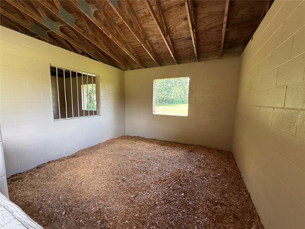 9901 Southwest 67th Terrace Ocala, FL 34476 - Photo 43 of 71 a view of empty room with windows
