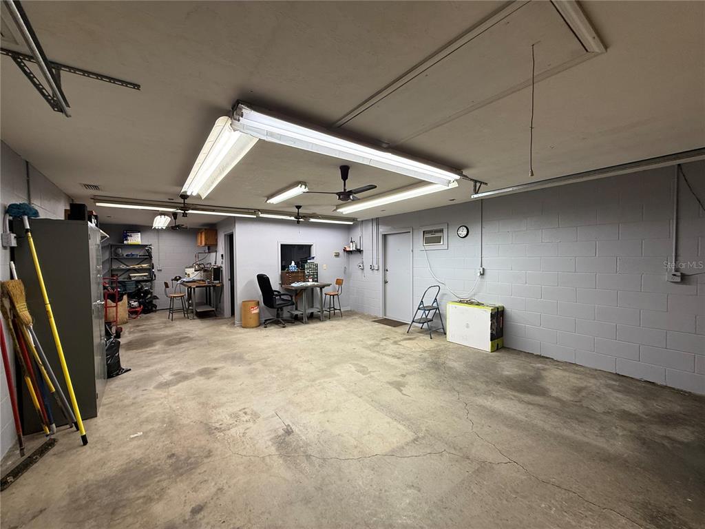9901 Southwest 67th Terrace Ocala, FL 34476 - Photo 47 of 71 a view of a bike storage and utility room