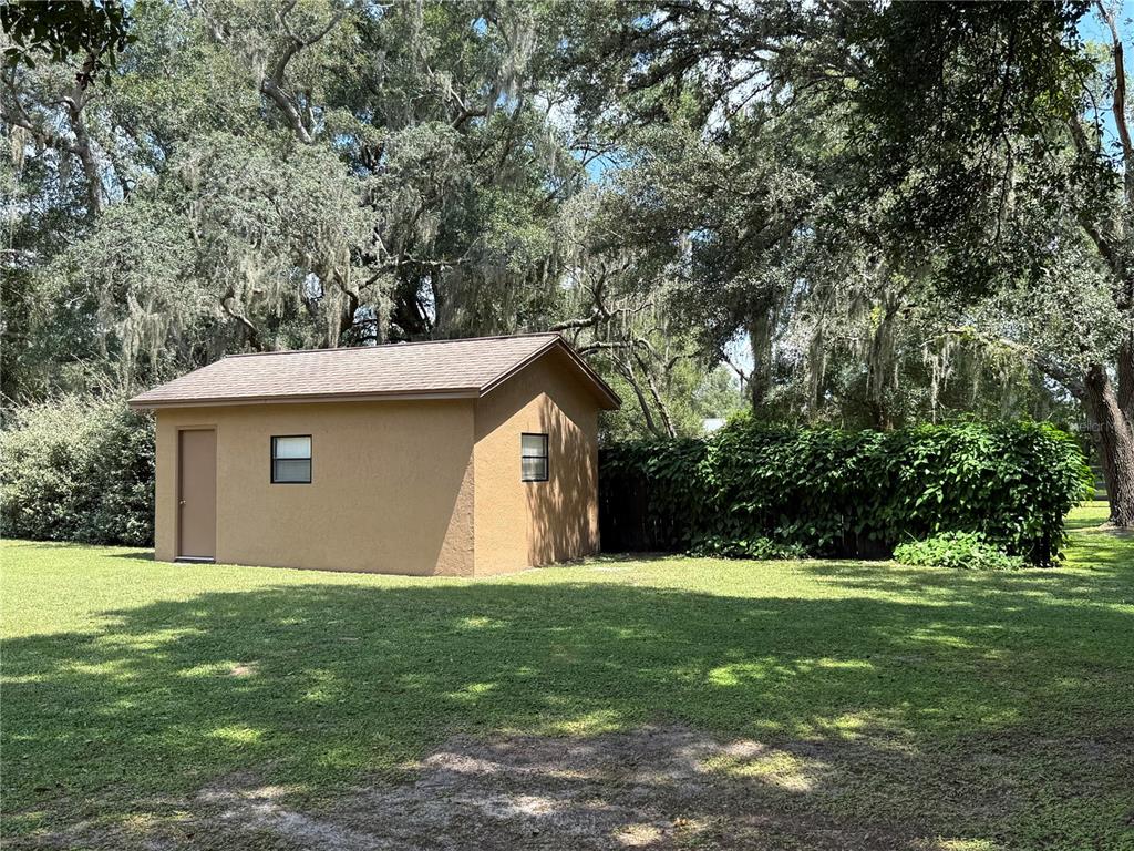 9901 Southwest 67th Terrace Ocala, FL 34476 - Photo 63 of 71 a front view of house with yard and green space