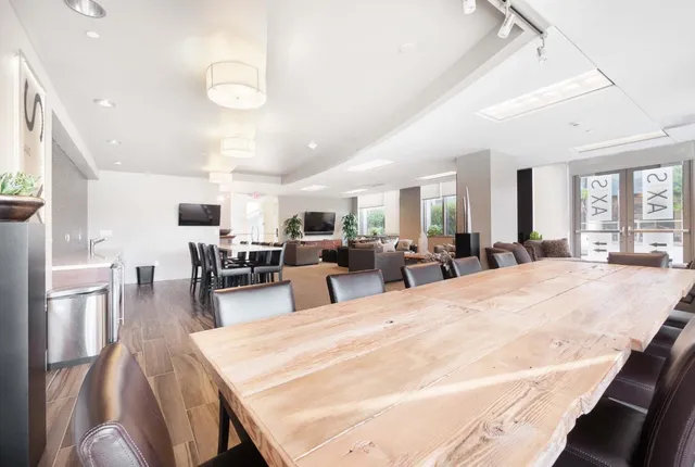 a large room with lots of table and chairs