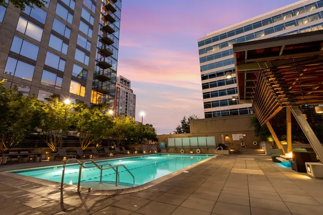 a view of a building with a yard