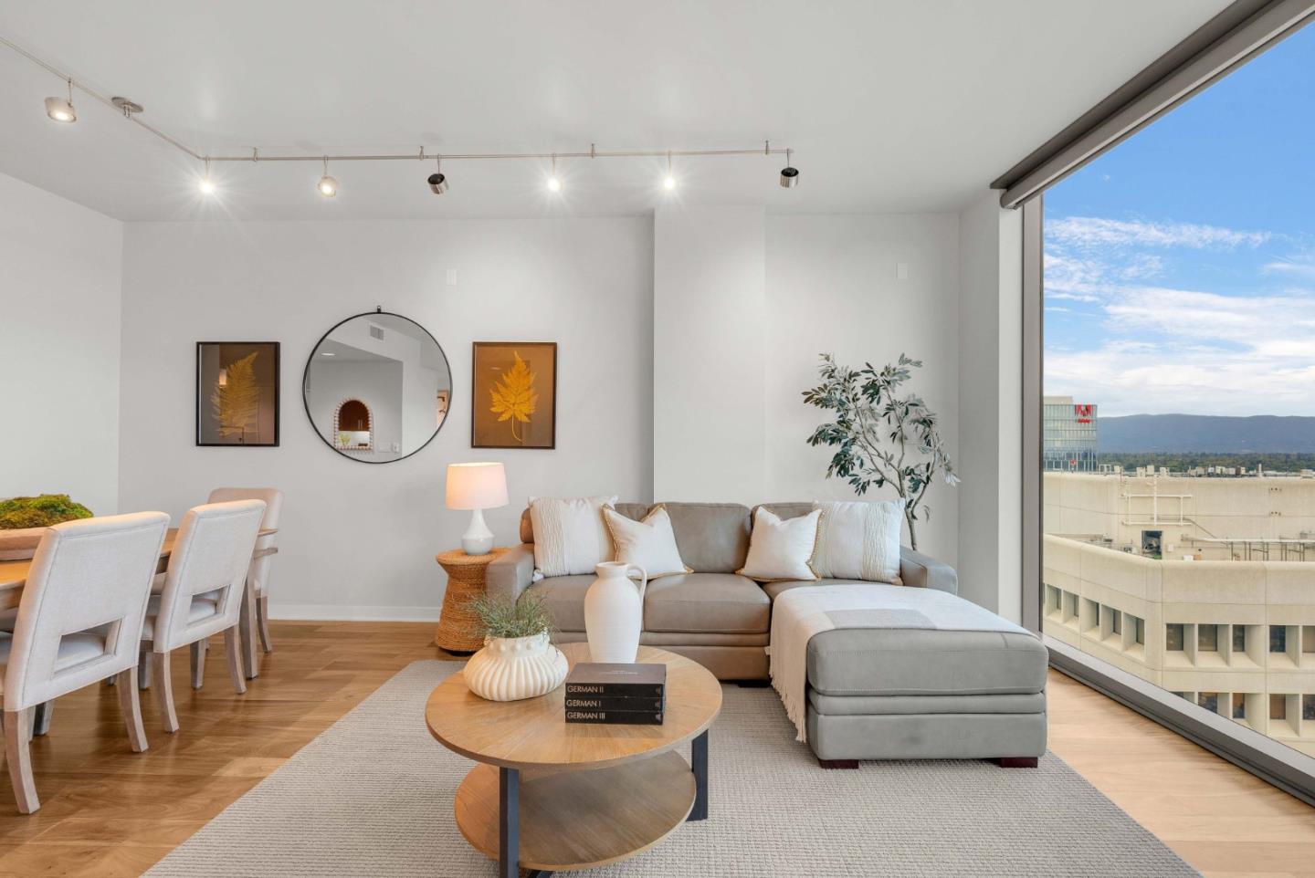 38 North Almaden Boulevard, Unit 1805 San Jose, CA 95110 - Photo 5 of 38 a living room with furniture and a large window