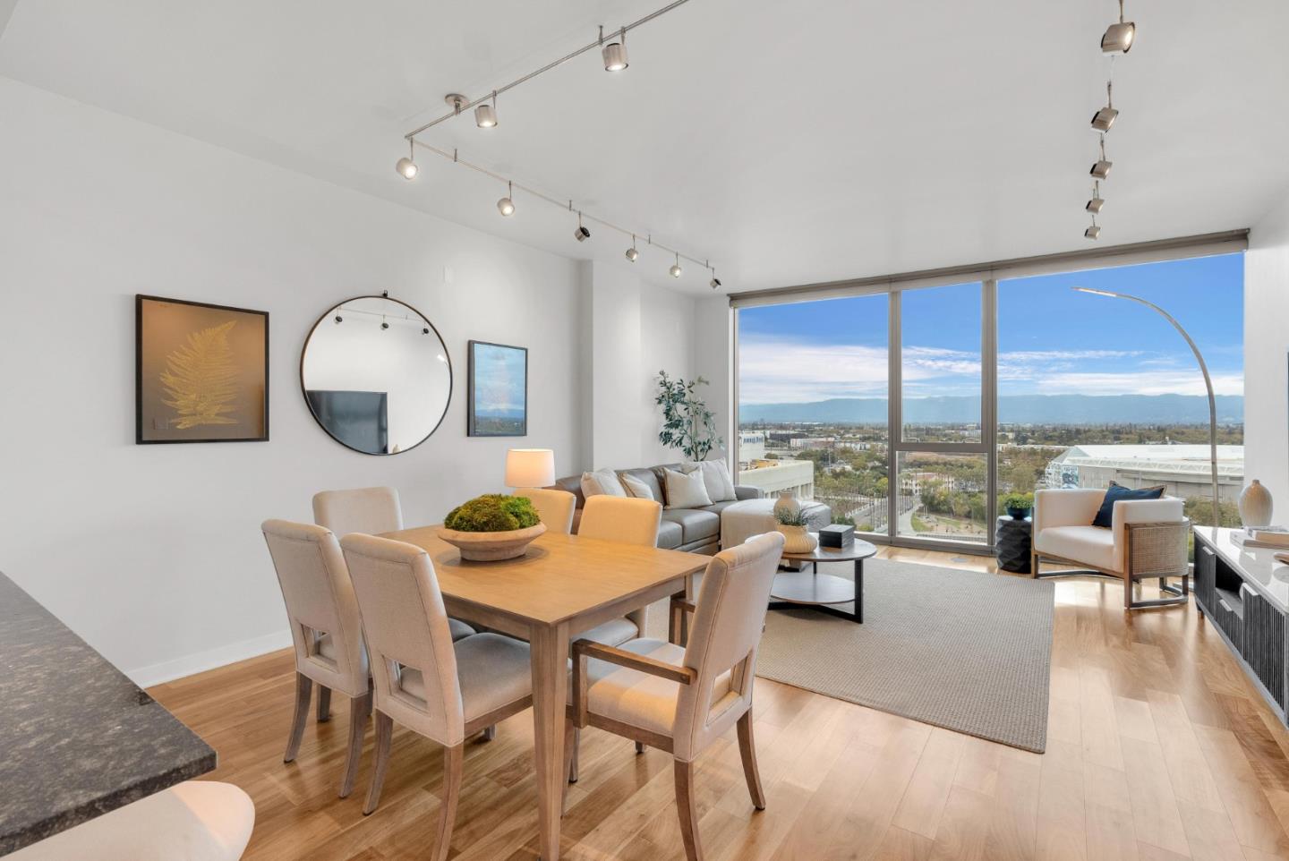 38 North Almaden Boulevard, Unit 1805 San Jose, CA 95110 - Photo 6 of 38 a living room with furniture and a large window